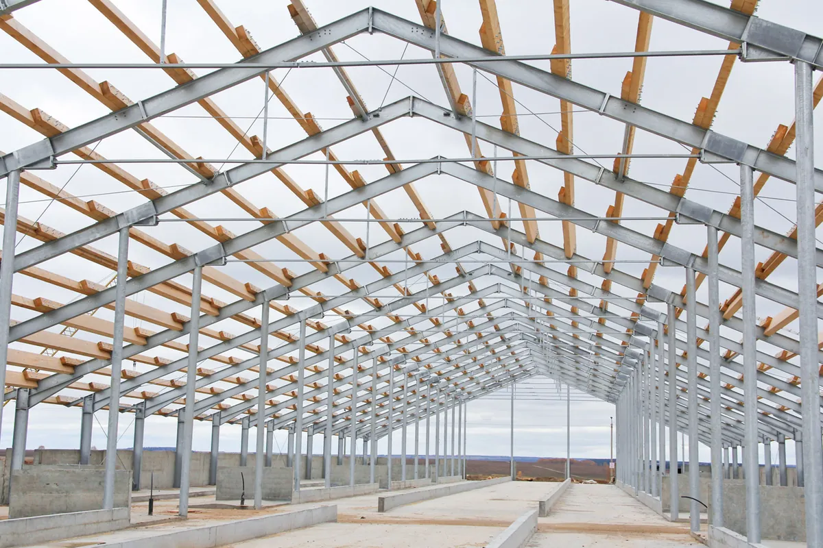 Steel roof framing of a large building under construction